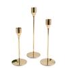 Elegant European Candle Holder Set: Electroplated Three-Piece Metal Ornament for High-End Dining and Wedding Décor.