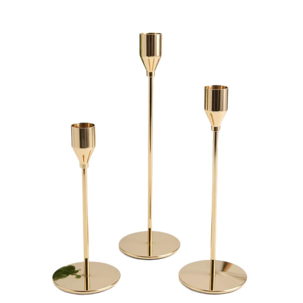 Elegant European Candle Holder Set: Electroplated Three-Piece Metal Ornament for High-End Dining and Wedding Décor.