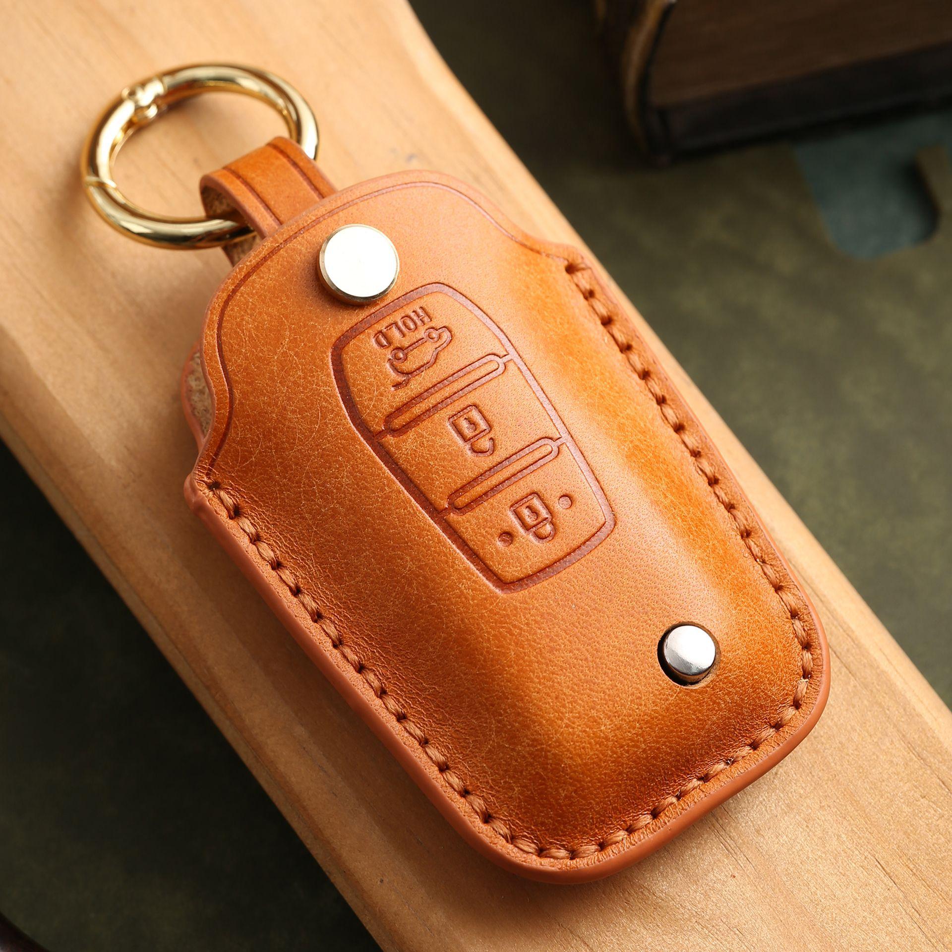 

Индивидуализированный чехол для ключа подходит для кожаного чехла ручной работы для защиты ключа с пряжкой автомобиля Shuanglong Tivira оранжевый