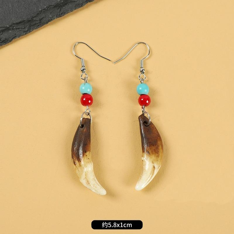 Tibetan wolf tooth earrings Tibetan silver inlaid real Tibetan mastiff dog tooth personality temperament niche earrings Tibetan earrings