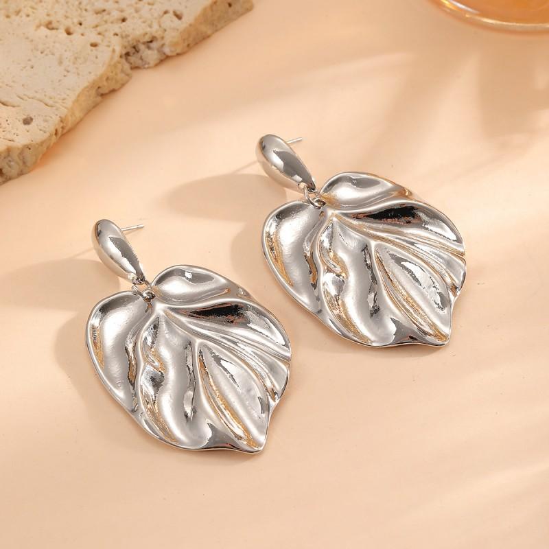 Elegant Zinc Alloy Leaf Earrings Women Gold Toned Minimalist Fashion Studs Trendy Botanical Jewelry Daily Wear