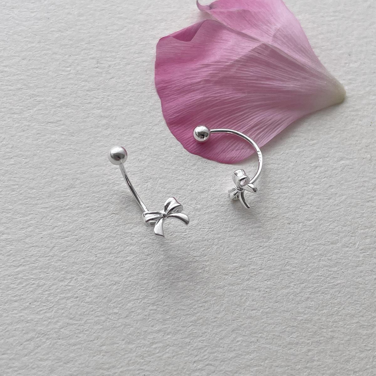 

925 sterling silver bow stud earrings for women s niche high-end rear-hanging earrings, exquisite, sweet and versatile new earrings. 925 silver