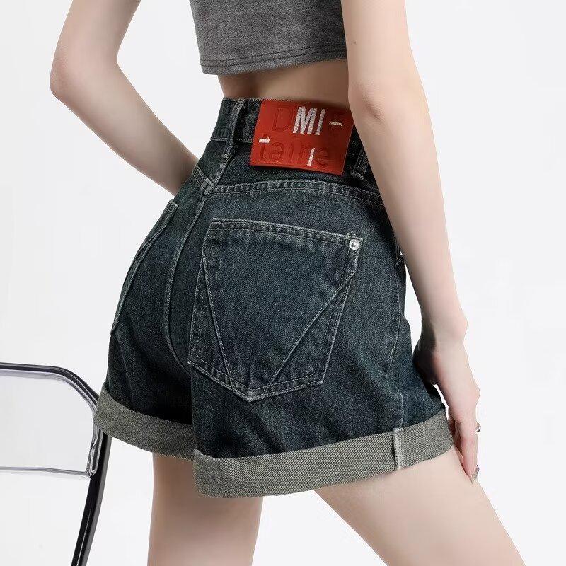 

2024 Женские джинсовые шорты с высокой талией, утягивающие, с подвернутым краем - Трендовый европейский стиль M темно-синий