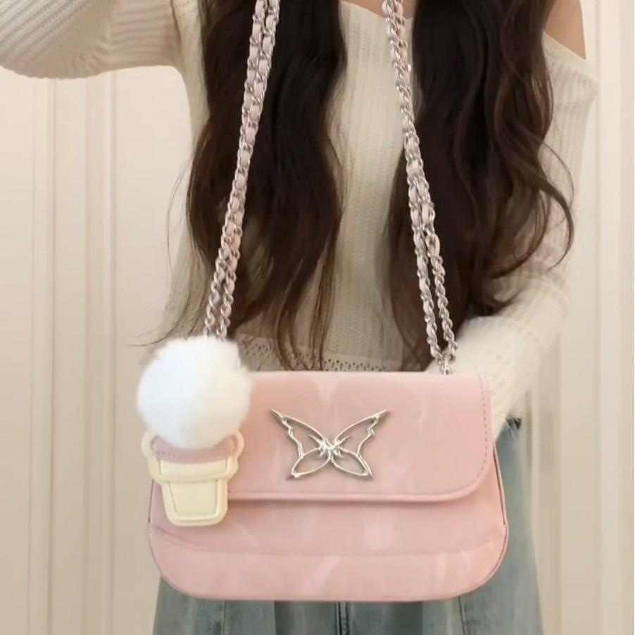 

Super fire small bag women s summer Korean version butterfly chain bag high-end texture small square bag commuter shoulder oblique span bag розовый