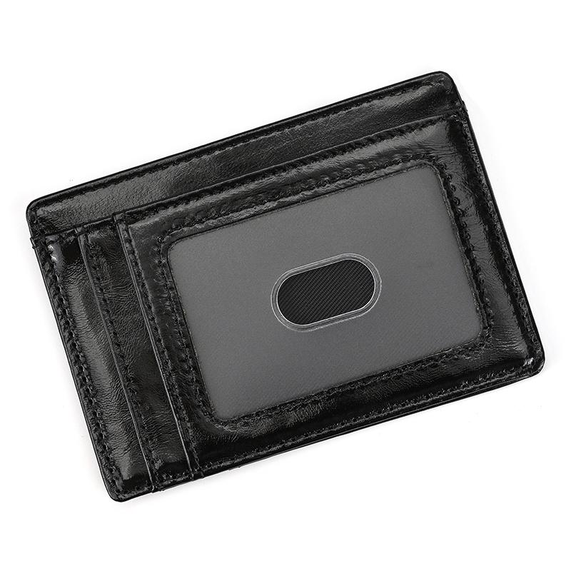 

Newsbirds Simple Style Cow Leather Pocket Wallet Coin Purse Card Holders Leather Coin Bag Men Women Leather Small Wallet чорний