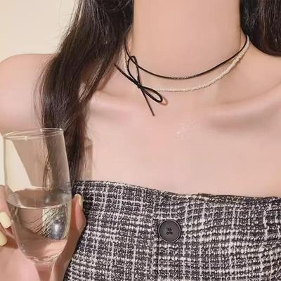 Doppellagige Perlen-Schleifenkette: High-End, Einzigartiger, Süßer & Cooler Schlüsselbeinschmuck für Frauen.