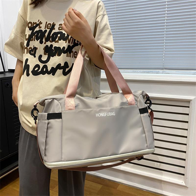 Travel bag Large capacity portable business trip portable delivery storage bag Sports fitness bag Luggage bag Short trip bag