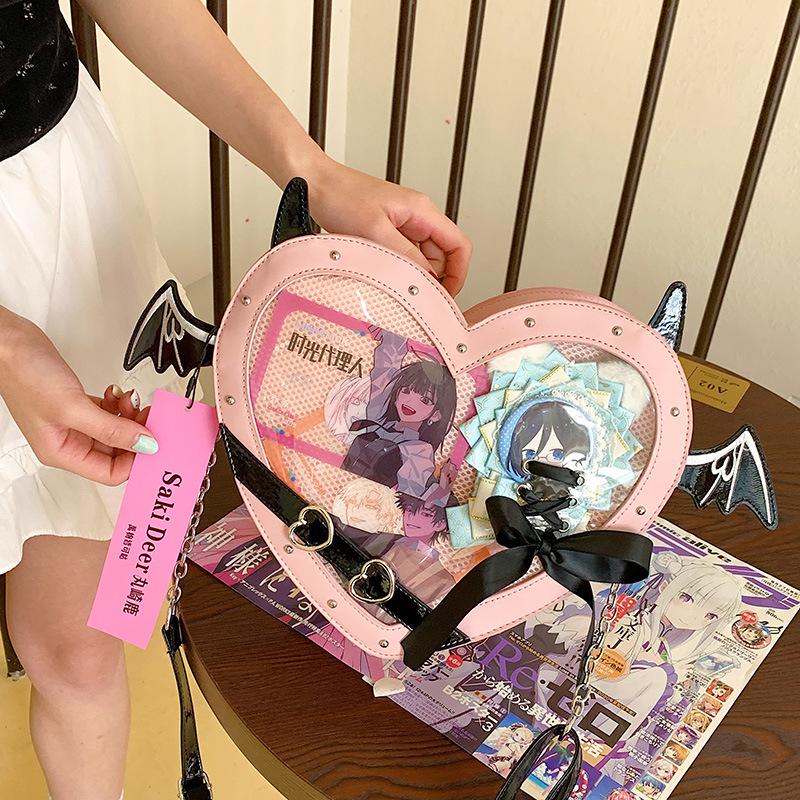 

Personalized and creative small bag women s 2025 new Mori fashion rivet niche transparent shoulder bag crossbody love bag рожевий