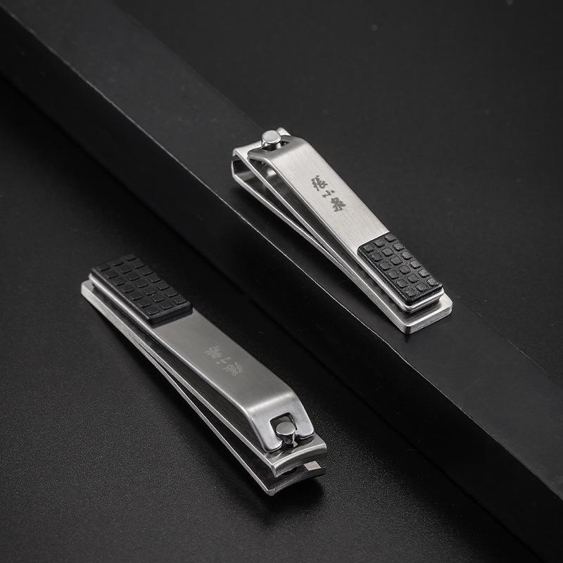 Zhang Xiaoquan Arc-Shaped Stainless Steel Nail Clippers with Foot File, Single Pack for Home Use.