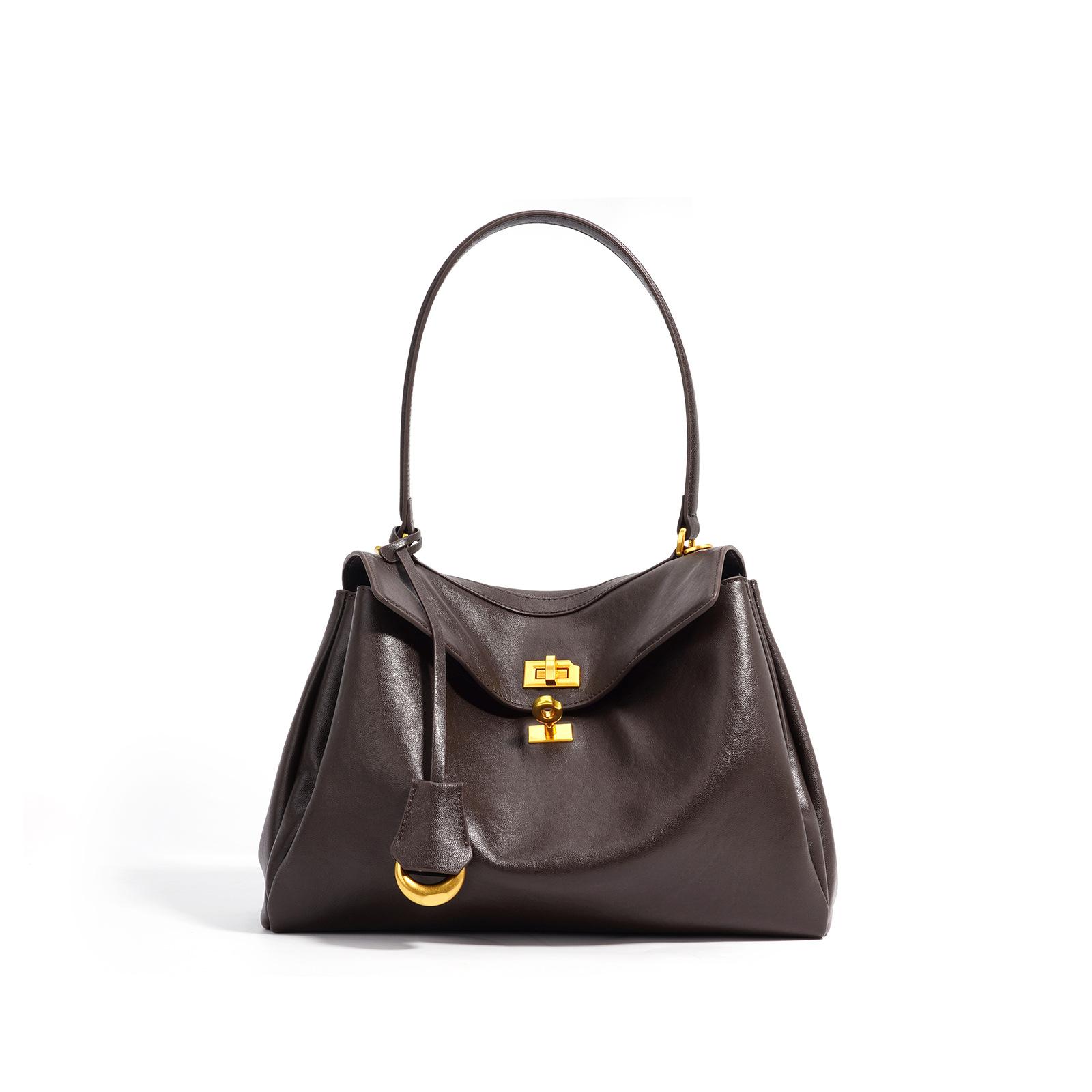 

Новая сумка большой вместимости Женская новая нишевая универсальная ручная женская сумка Сумка через плечо шоколадный