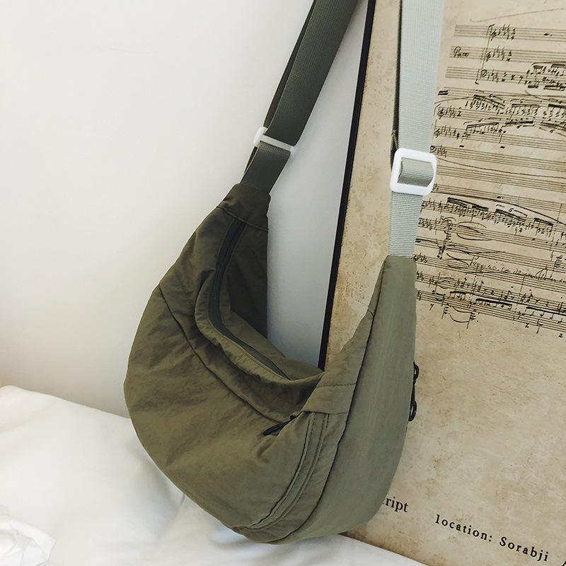 Casual crossbody bag girls lightweight shoulder canvas bag waterproof commuting solid color versatile nylon dumpling bag for men