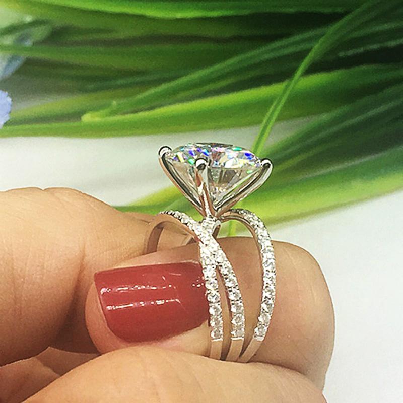 Nye utsøkte korsgarnringer for kvinner AAA runde cubic zirconia briljante brude bryllupsfest Fingerring motesmykker