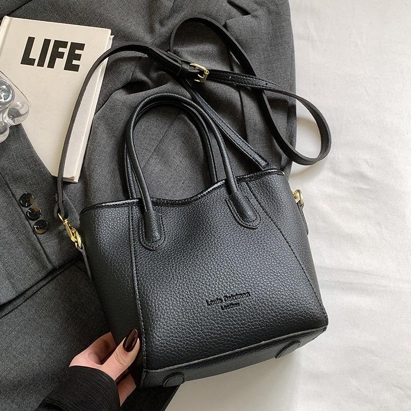 Stylish and Simple Style Lychee Pattern Texture Portable Bucket Bag Korean Version Casual Commuting Versatile Solid Color Messenger Women's Bag