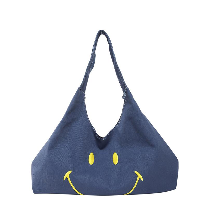 Travel bag, large capacity, high-end canvas shoulder bag, casual smiley handbag, versatile daily fitness business trip bag
