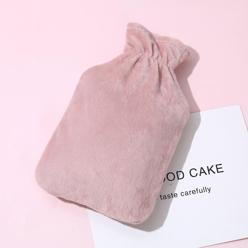 Thickened, explosion-proof hot water bottle for girls with imitation rabbit fur; perfect as a hand warmer, stomach compress, or foot warmer.