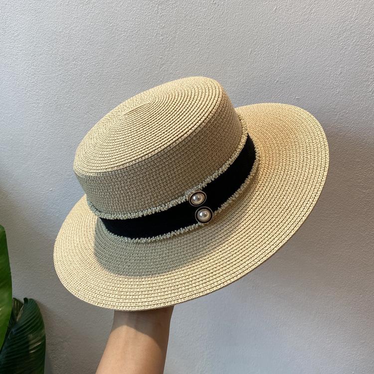 Spring and summer flat top top hat sticker straw woven big eaves hat seaside vacation straw hat sun protection beach hat French sun hat women