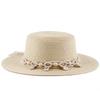 Spring and summer women's fashion shell braided flower belt decorative flat top top hat British lady style small straw hat vacation visor