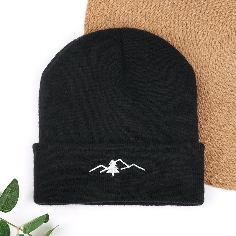 Autumn and winter knitted hats men's cold hats new warm and cold-proof solid color women's mountain pullover wool hats