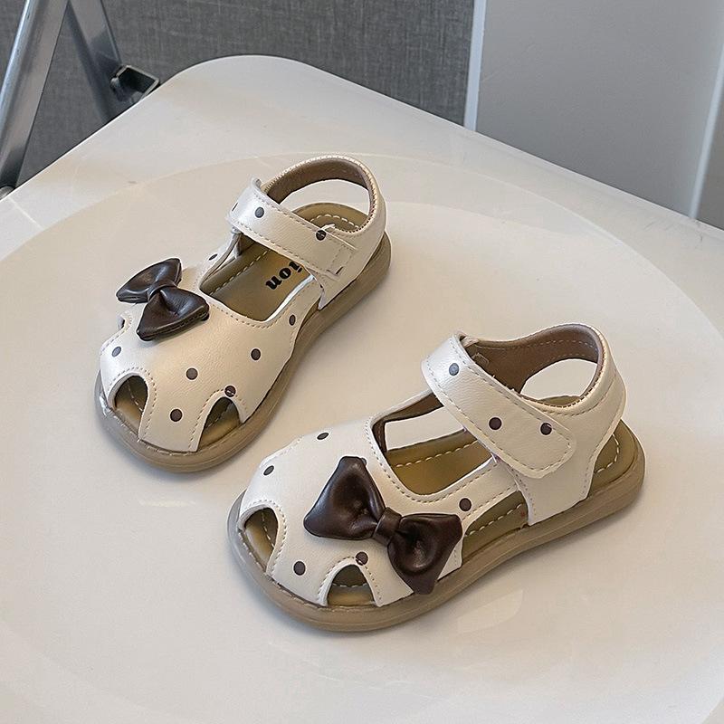 

Children s Solid Color Closed-Toe Sandals2026New Summer Girls Cute Bow Hollow Sandals Beach Shoes 23-28Code one hand6Double бежевый