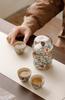 Golden Plum Ru Kiln Portable Tea Set: Quick-Brew Pot with Four Cups for Outdoor Camping and Kung Fu Tea