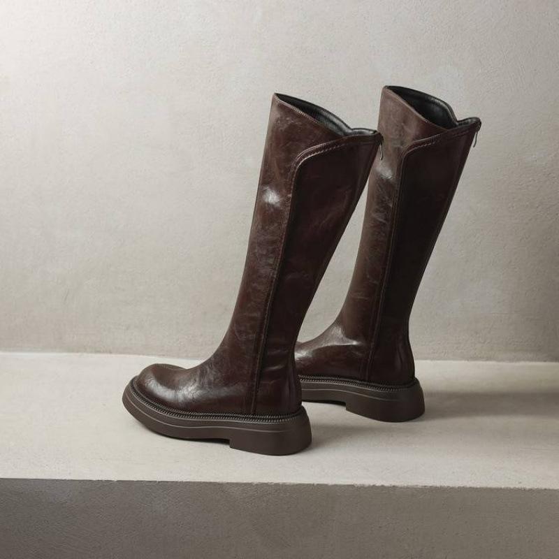 Korean version of rubber sole thick sole non-slip solid color Martin boots rear zipper comfortable middle heel round head autumn and winter hi