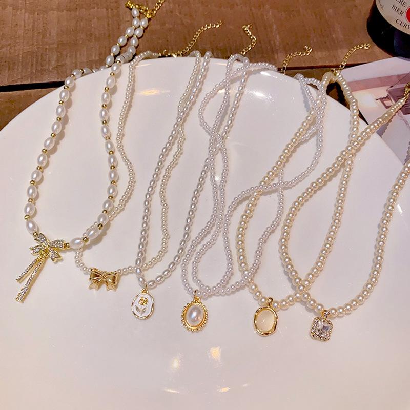 Luxury Korean Bucklo Pearl Necklace for Women: All-Match Love Pendant Clavicle Chain