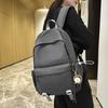 Schoolbag1011 new versatile black schoolbag male college student large capacity backpack female junior high school girl solid color backpack