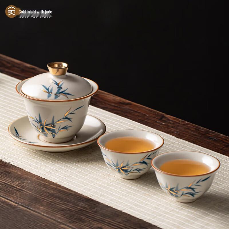 

Chen Peiming Gold Inlaid Jade Ru Kiln Kung Fu Tea Set