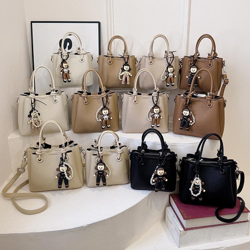 Sommer neuer Mode-Stil vielseitige Tragetasche tragbare Schulter schräg über die Schulter Damenhandtasche