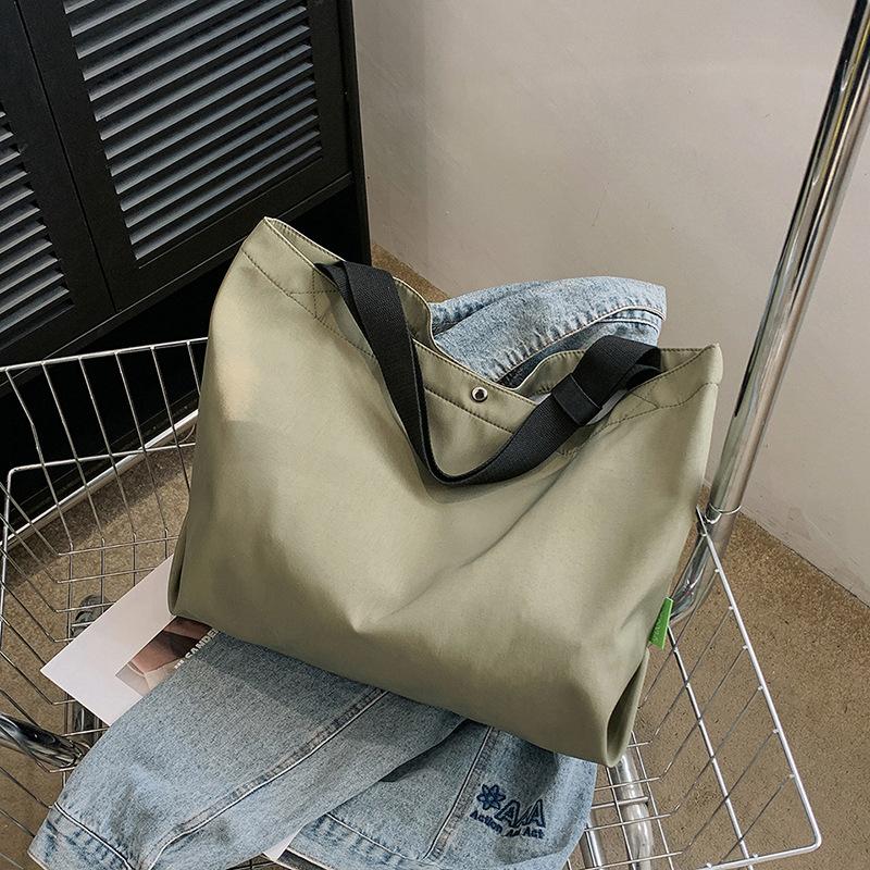

Lazy wind canvas bag women s 2025 summer new casual versatile large-capacity student commuting shoulder handbag 54*17*34 зелёный