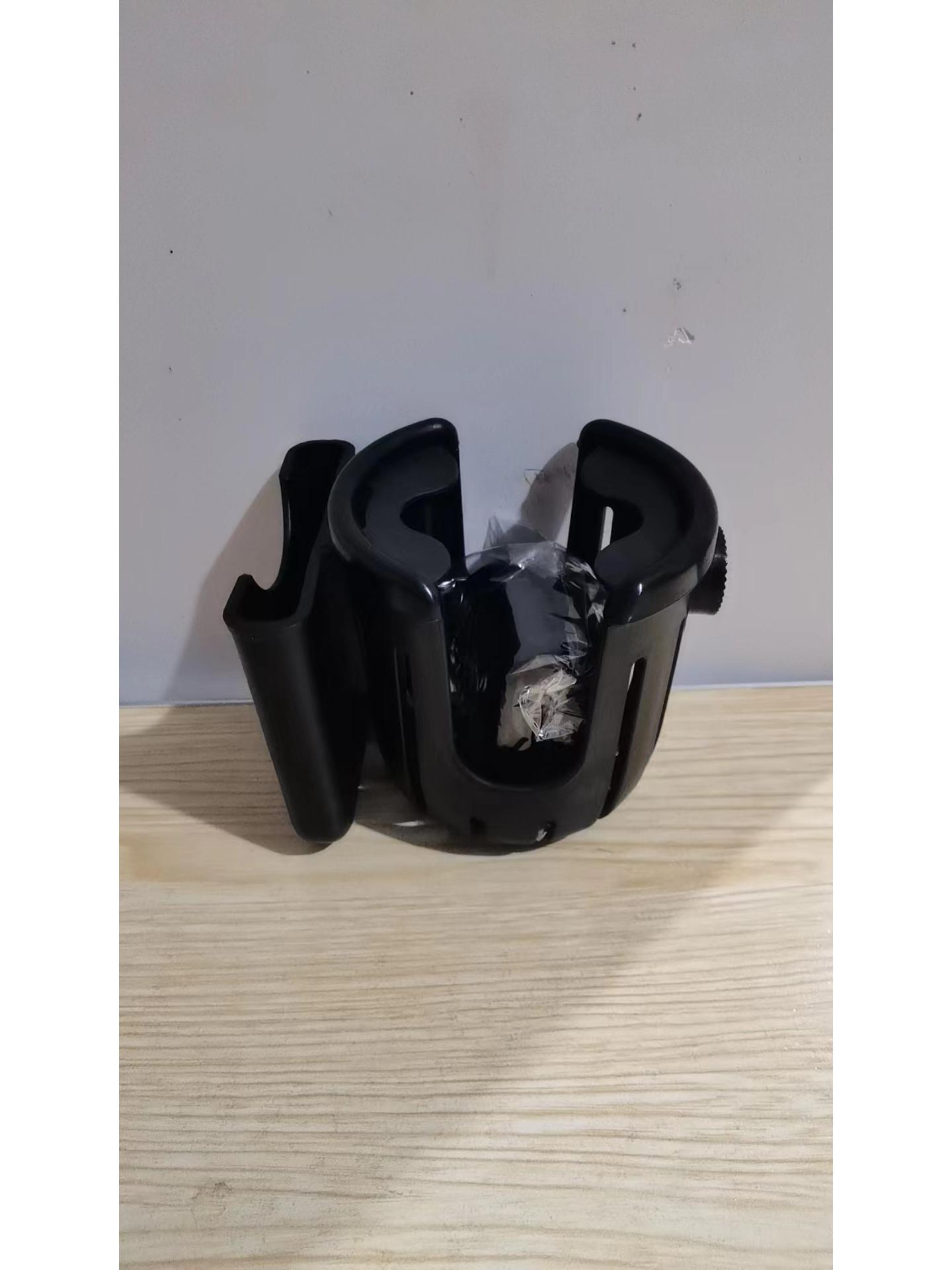 

Multi-Purpose Cup & Phone Holder: For Bikes, E-Vehicles, Strollers, Motorcycles - Fits Water Bottles, Milk Tea, Baby Bottles, and More.