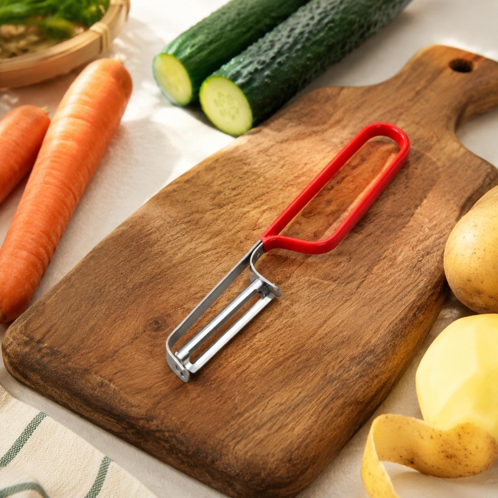 

Stainless Steel Vegetable Peeler Kitchen Tool with Ergonomic Handle for Efficient Fruit and Vegetable Skin Removal one size червоний