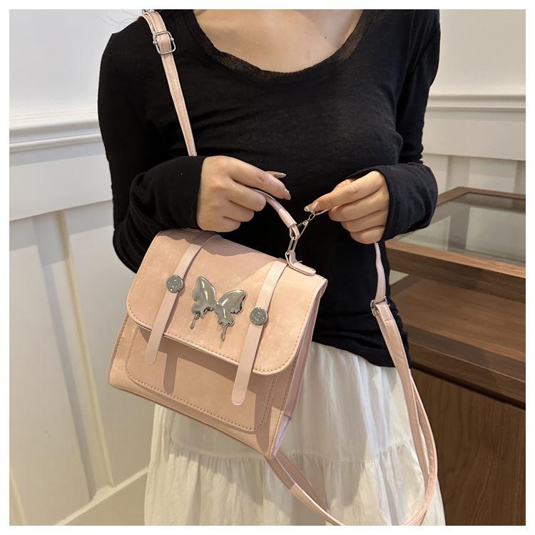 

Backpack Women s 2025 New Design Sense Niche Portable Korean Edition Student School Bag Small Lightweight Travel Backpack розовый