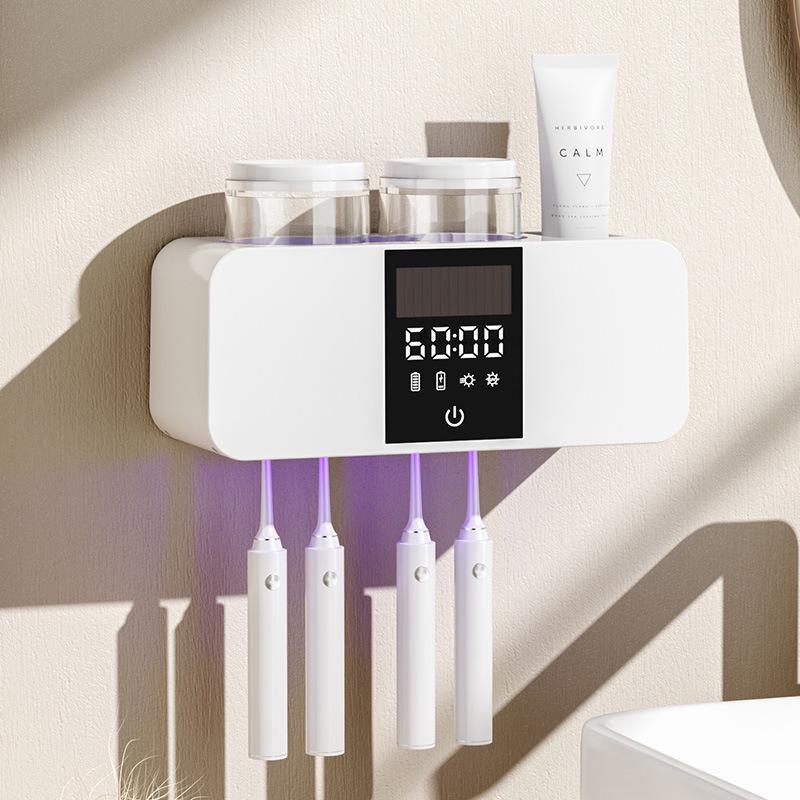 Olovvs Smart UV-Zahnbürstensterilisator mit elektrischer Trocknung, stanzfreier Installation, Mundspülbecher und Zahnpastahalter.