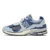 New Balance 2002R Protection Pack - Lila Unisex-Sneaker Hell-Arktisgrau M2002RDI