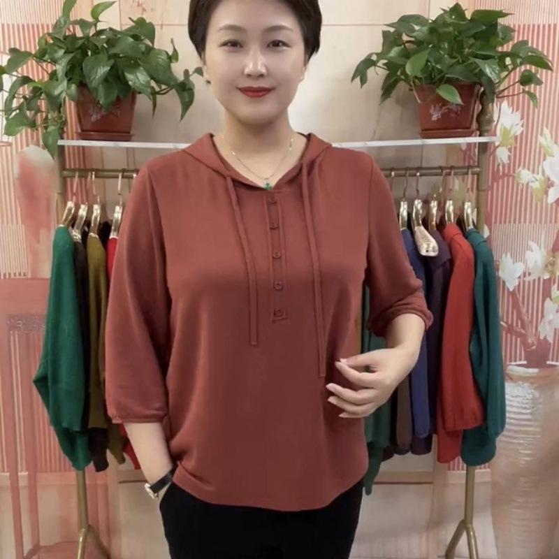 Chic Age-Defying Hooded Women's Spring Top - Loose Fit, Elastic, Versatile, Seven-Sleeve Design.