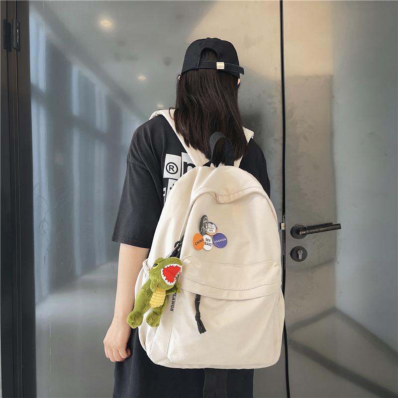 Schoolbag Backpack Men's Simple Lightweight Large Capacity Versatile Backpack Japanese Junior High School Student School Bag Women Send Badges