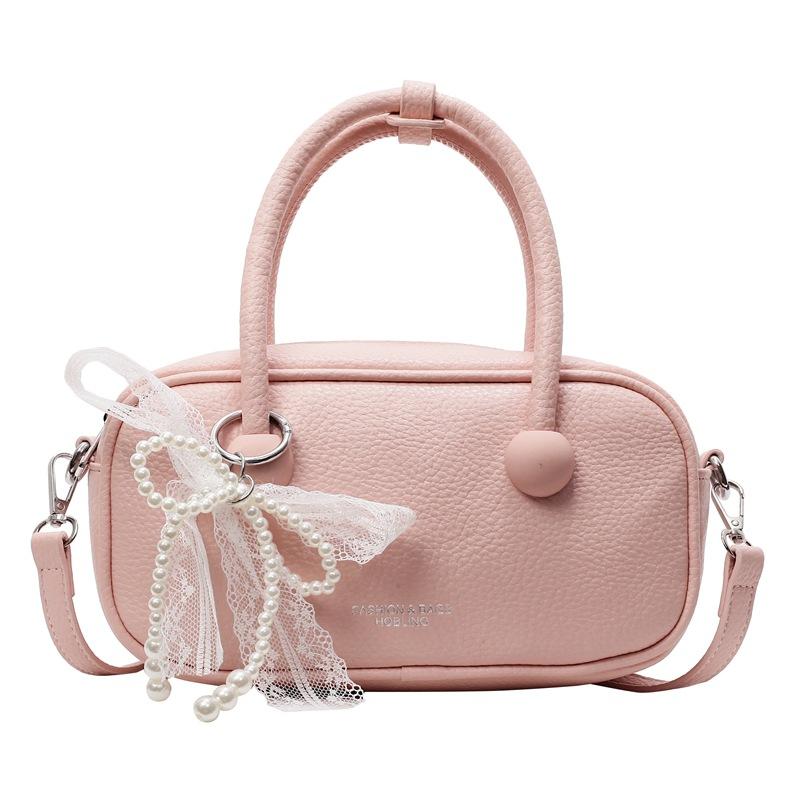 

Fashion solid color handbag women s 2025 spring new Korean simple messenger bag trendy commuter bowling bag No pendant