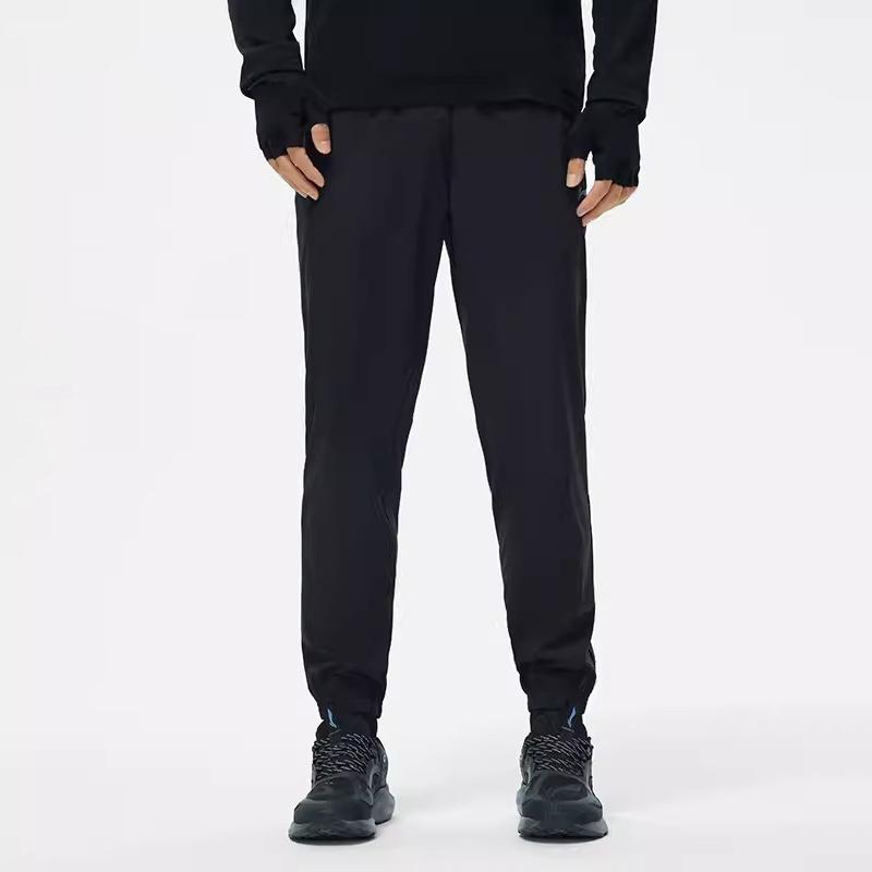 Li Ning Running Series Solid Color Mid Waist Comfortable Versatile Breathable Tapered Knit Sports Pants Men Bottoms Black YKLU271-1