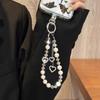 Premium Love Light Luxury Crystal Mobile Phone Lanyard Beaded Short Rope Pearl Wrist Women's Bag Pendant Glazed Diamond Hand Chain