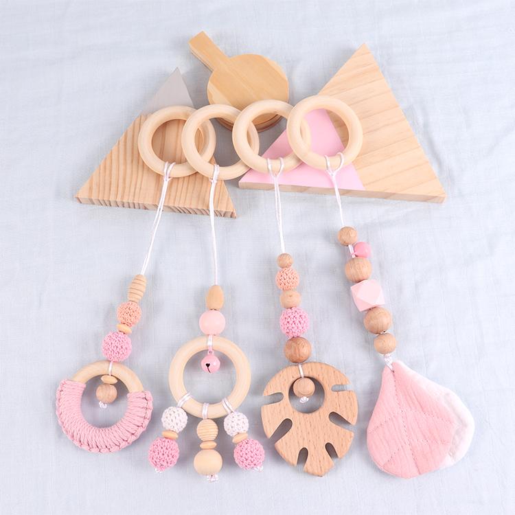 China Manufacturer Exquisite Color Leaf Four-piece Fitness Rack Pendant Wooden Baby Play Activity Gym