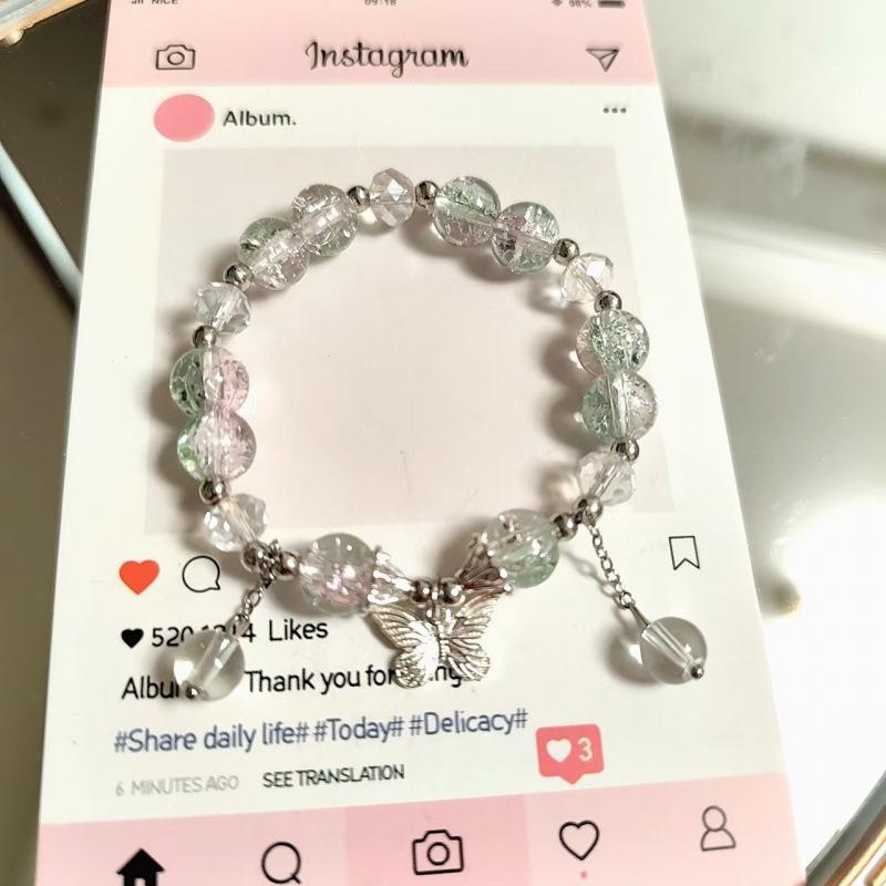Weihnachts-Charm-Armband mit Crackle-Perlen, Schneeflocken-, Baum-, Weihnachtsmann- und Glockenanhängern