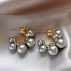 Grey pearl C-shaped earrings, fashionable temperament, high-end stud earrings, niche French elegant light luxury earrings, women