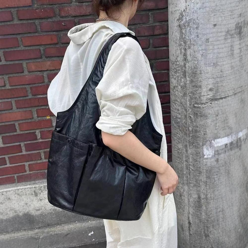 Korean niche design tote bag hand-held pleated underarm bag women's shoulder bag three pockets soft leather women's bag tide