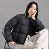 Winter new round neck short down jacket women's fashion simple design sense knitted splicing temperament warm jacket tide