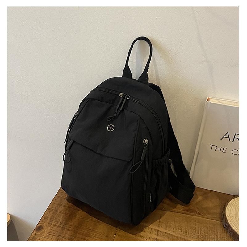 

Backpack ultra-light 2026 new high-end niche nylon canvas to work commuter travel backpack small and lightweight Standard чёрный