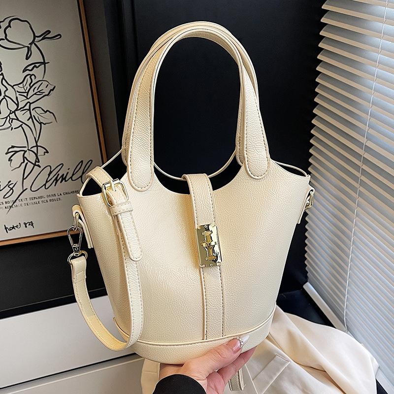 This Year's Popular Fashion Korean Version of Simple Solid Color Portable Bucket Bag Women's Casual Versatile Commuter Messenger Child and Mother Bag