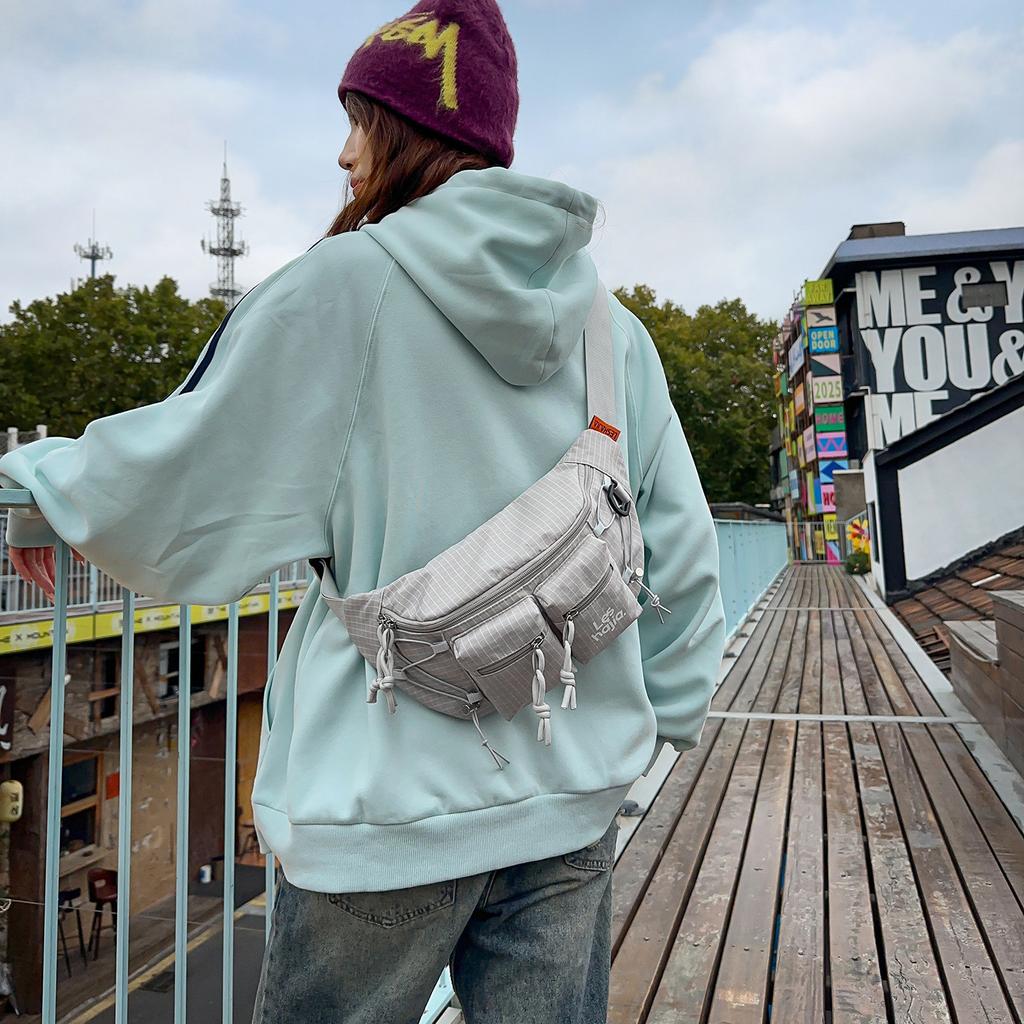 Trendige Marken-Brusttasche, lässige Herren-Umhängetasche, Sport-Handy-Bauchtasche, einfache und leichte kleine Pendler-Rucksacktasche für Damen, Trend