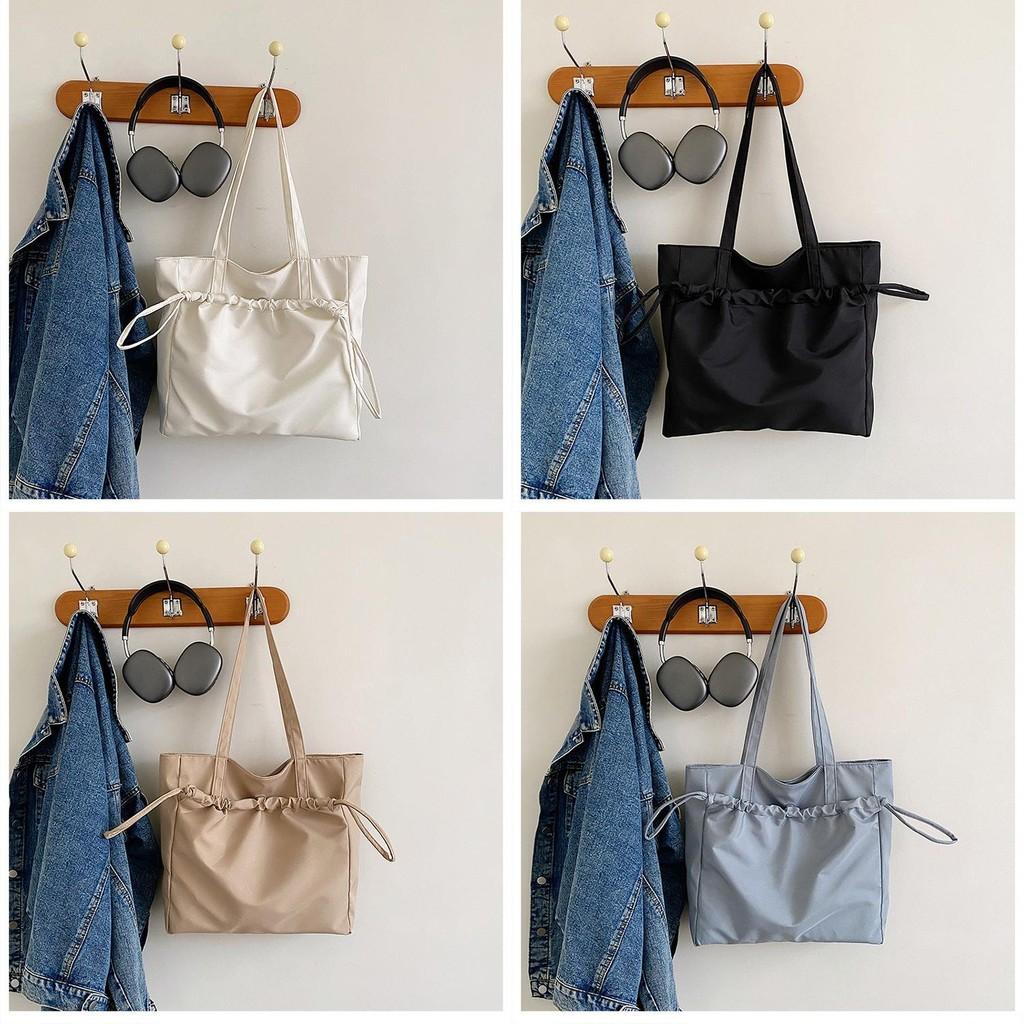 Contemporary Versatile Tote Bag For Casual Outfits With Spacious Design And Sleek Zipper Closure