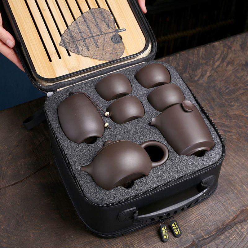 Zisha Travel Tea Set: Portable Xishi Pot with Quick-Brew Cup and Four Cups - Perfect for Outdoor or Home Tea Ceremonies.